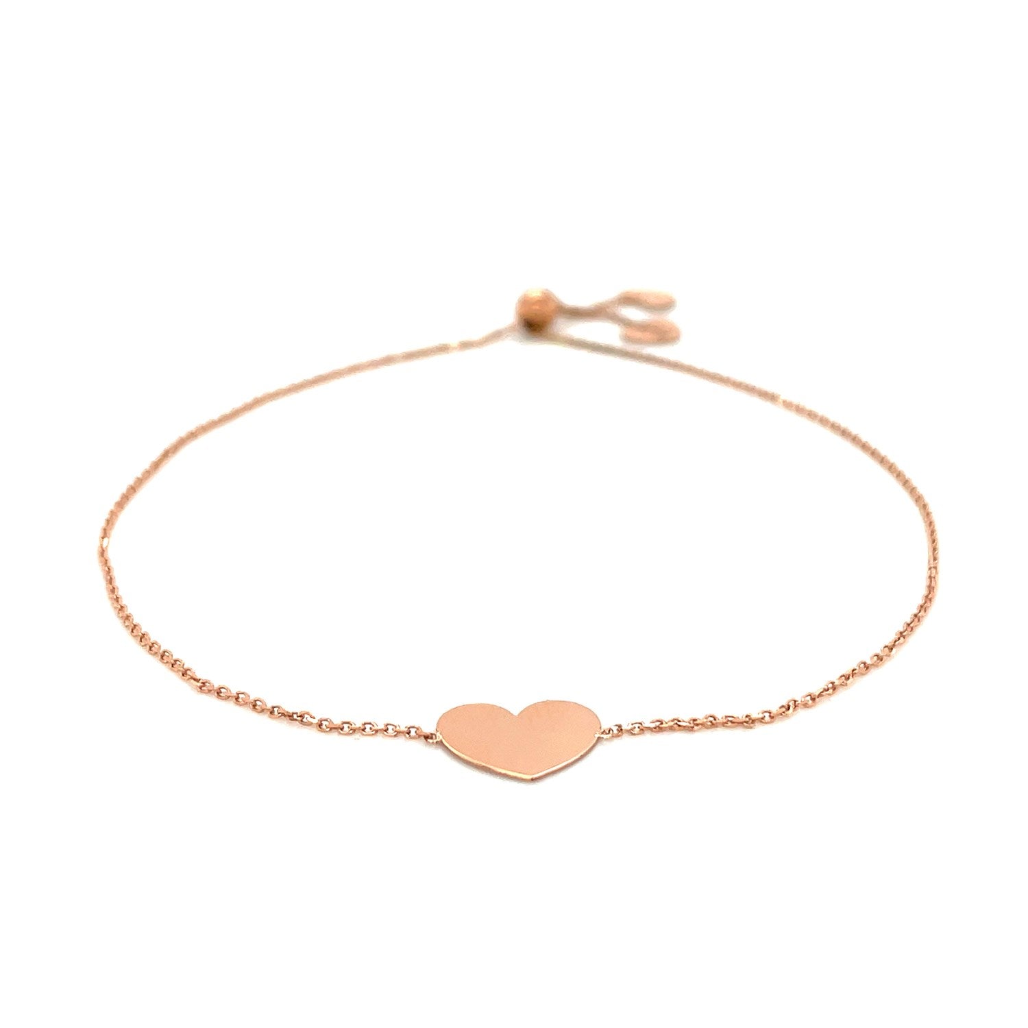 14k rose gold adjustable bracelet with a polished heart charm.