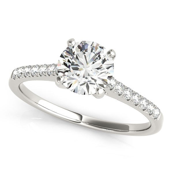 14k white gold engagement ring with a round diamond and pavé band.
