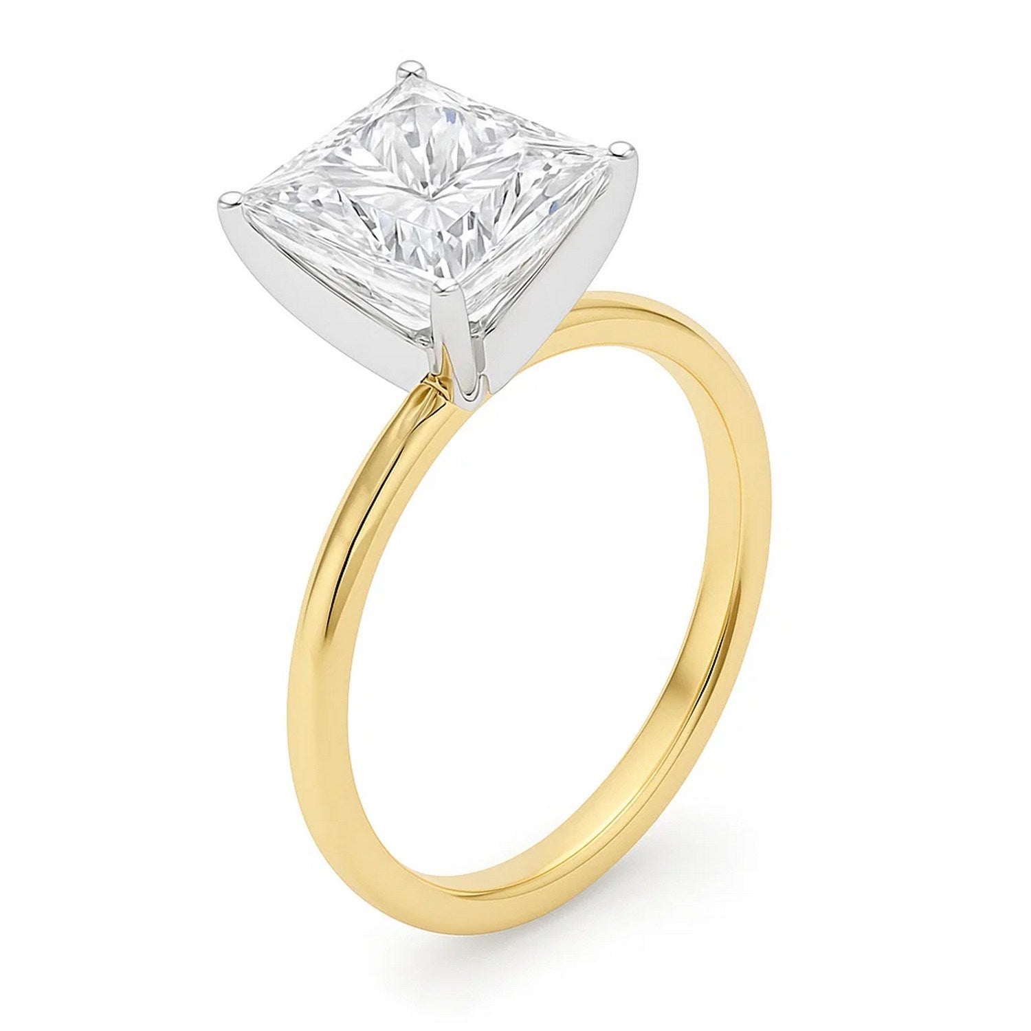 A princess-cut lab-grown diamond solitaire ring with a yellow gold band.