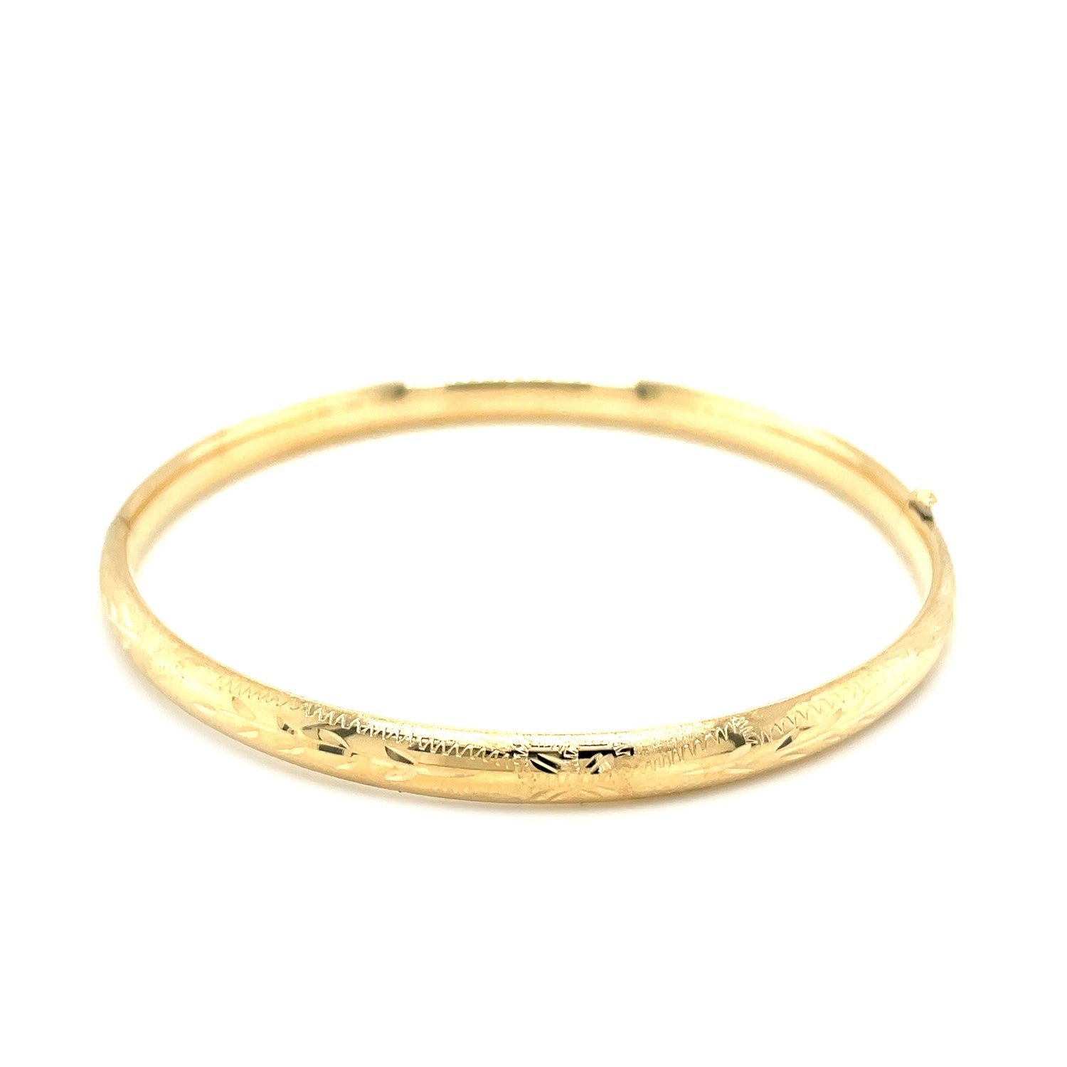 10k yellow gold botanical pattern Florentine bangle with a dome design.