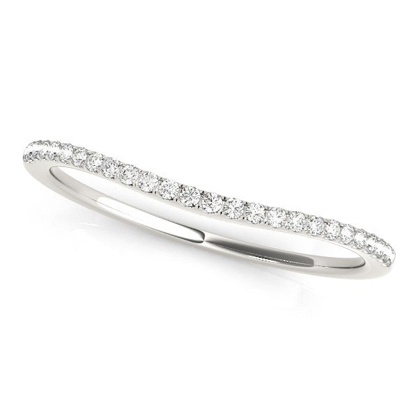 A curved 14k white gold wedding band with pave-set round diamonds.