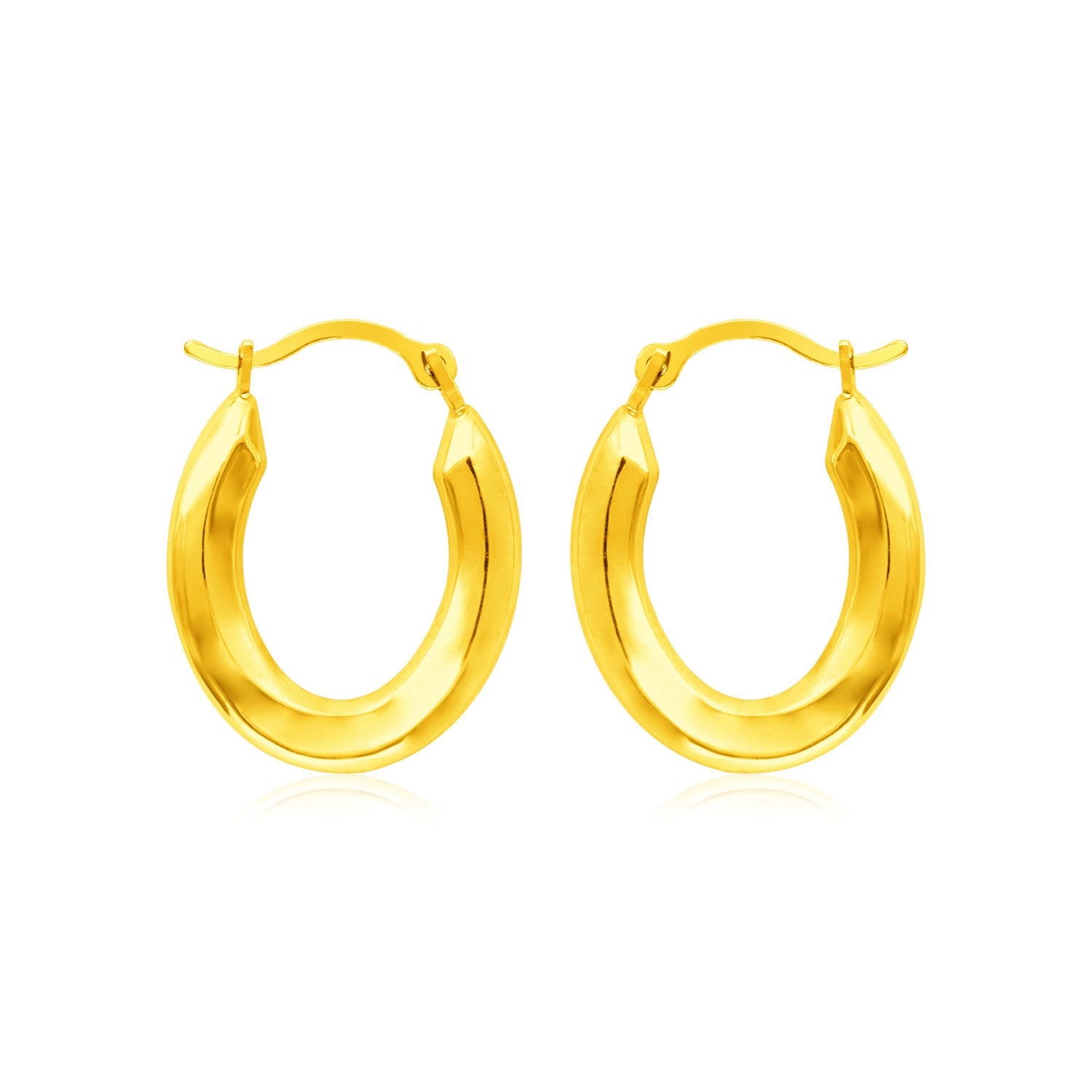14k yellow gold polished oval hoop earrings with hinged clasps.