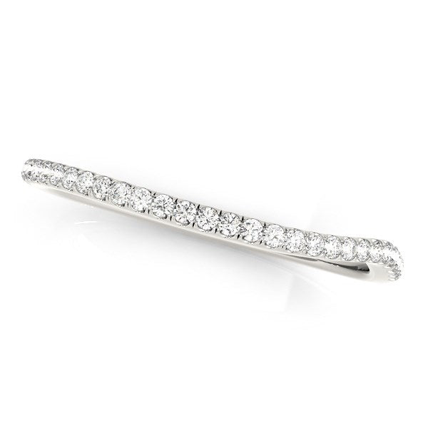 14k white gold slim curved wedding ring with pave set round diamonds.