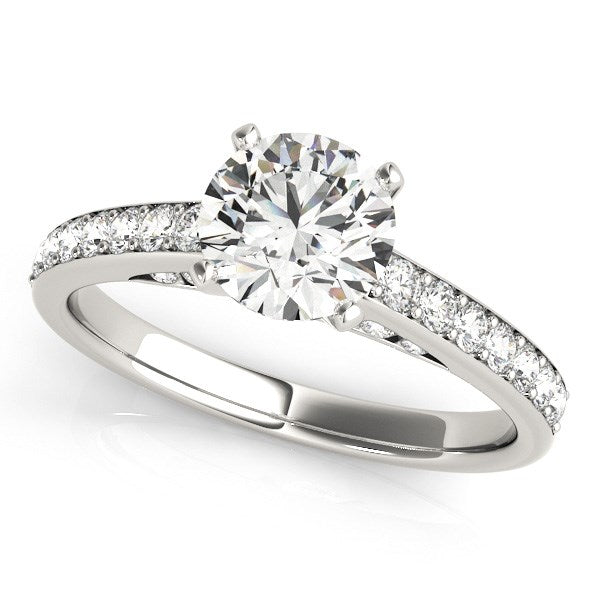 A 14k white gold engagement ring with a round center diamond and a single row of side diamonds.