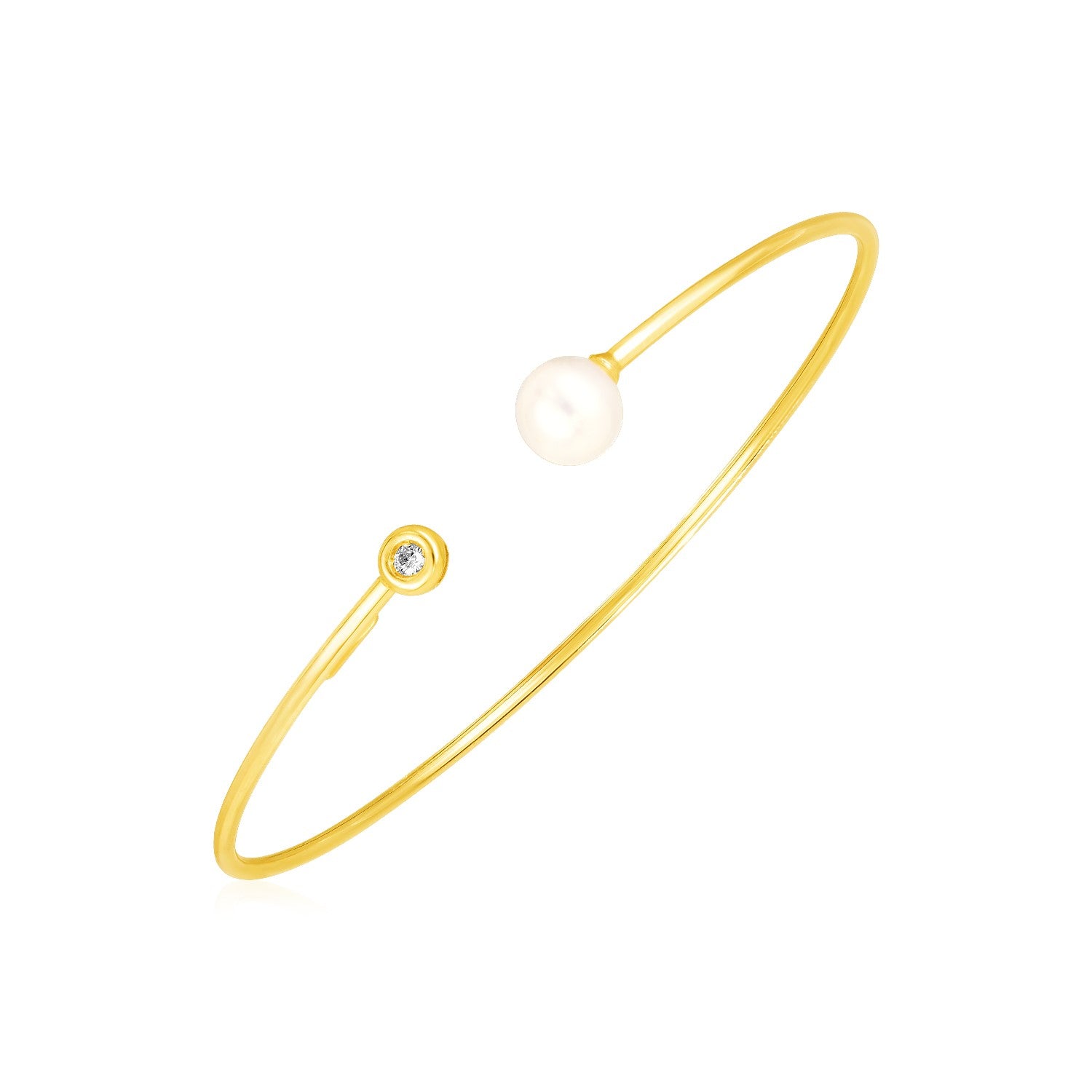 14k yellow gold cuff bangle with a pearl on one end and a diamond on the other.