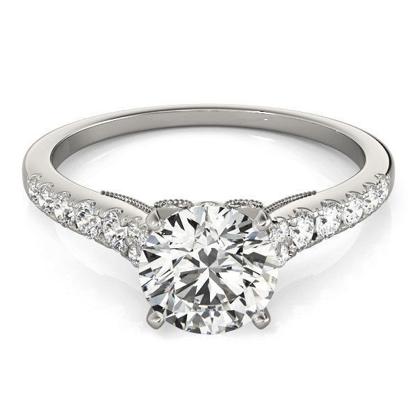 14k white gold engagement ring with a round diamond and a single row of diamonds.