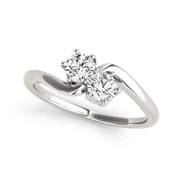 Two-stone diamond ring in 14k white gold with a curved band.