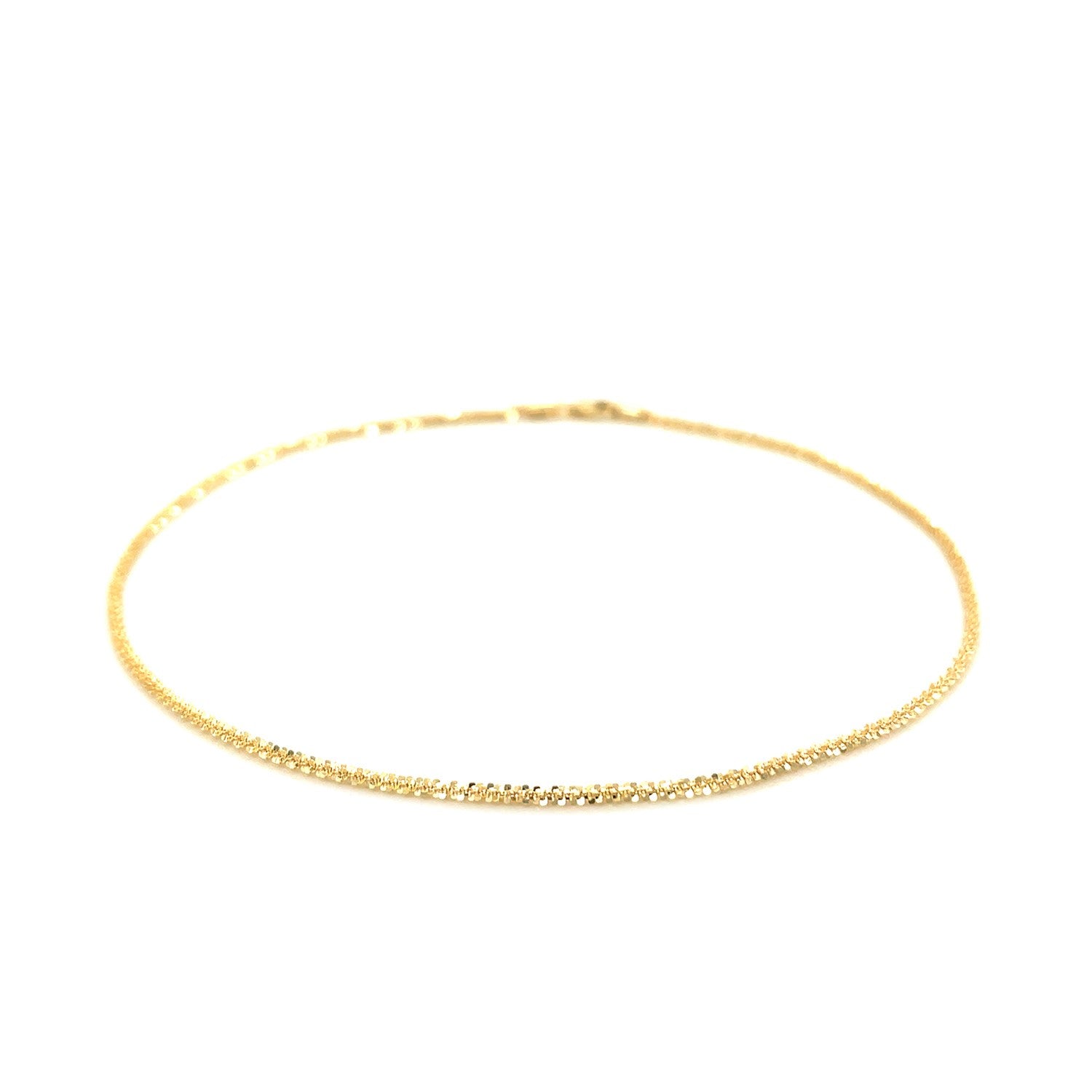 A 10k yellow gold sparkle anklet with a 1.5mm width.