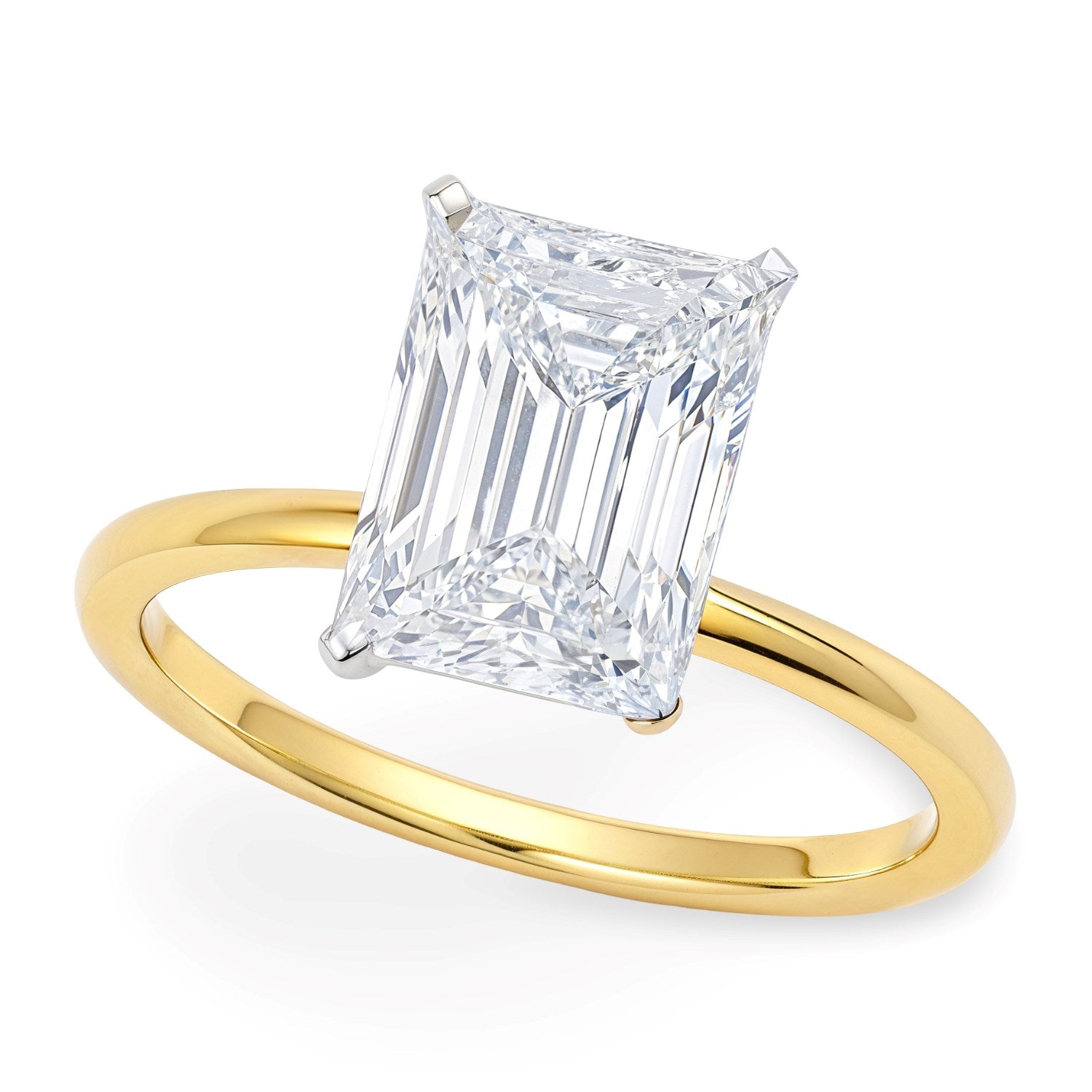 A radiant-cut lab-grown diamond solitaire ring with a yellow gold band.