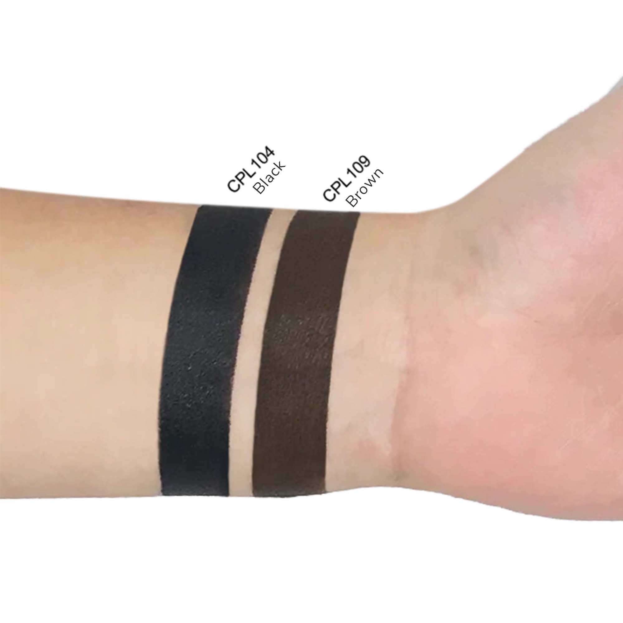 Two swatches of eyeliner, black and brown, are shown on a person's arm.